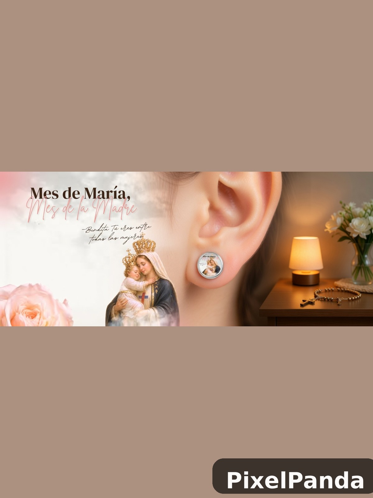Close-up of ear wearing religious medallion earring with spiritual imagery