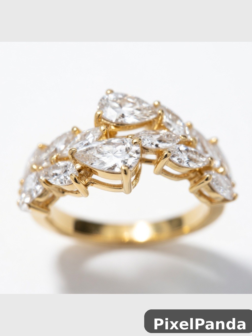Gold ring with pear-shaped crystal stones clustered design