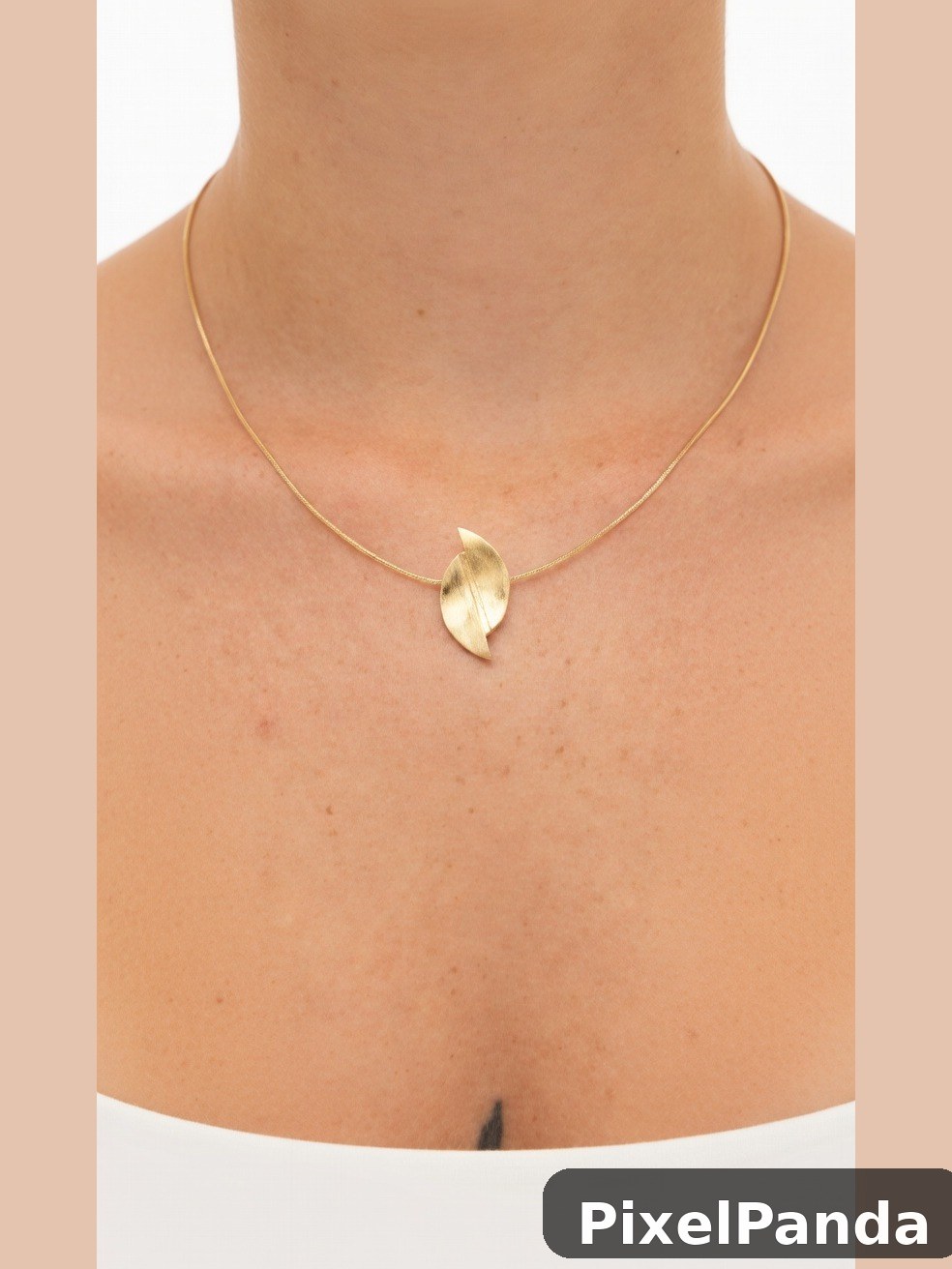 Gold leaf pendant necklace on snake chain
