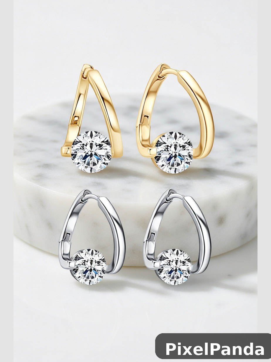 Gold and silver hoop earrings with round cubic zirconia stones