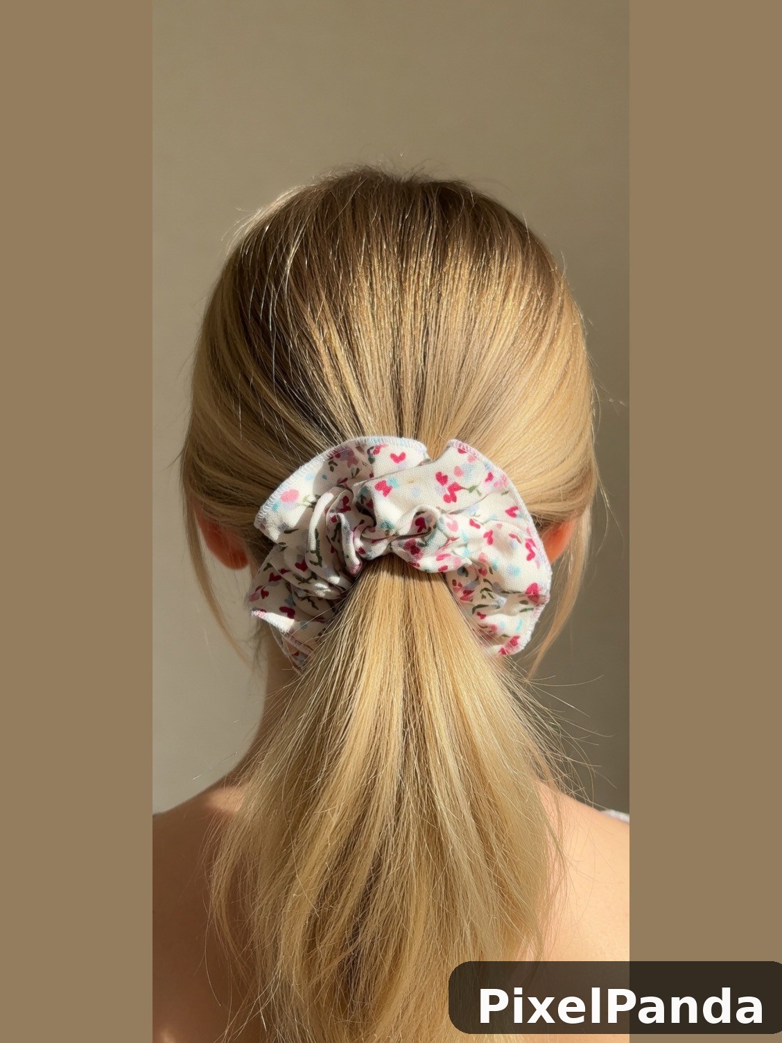 Blonde hair with floral print scrunchie back view