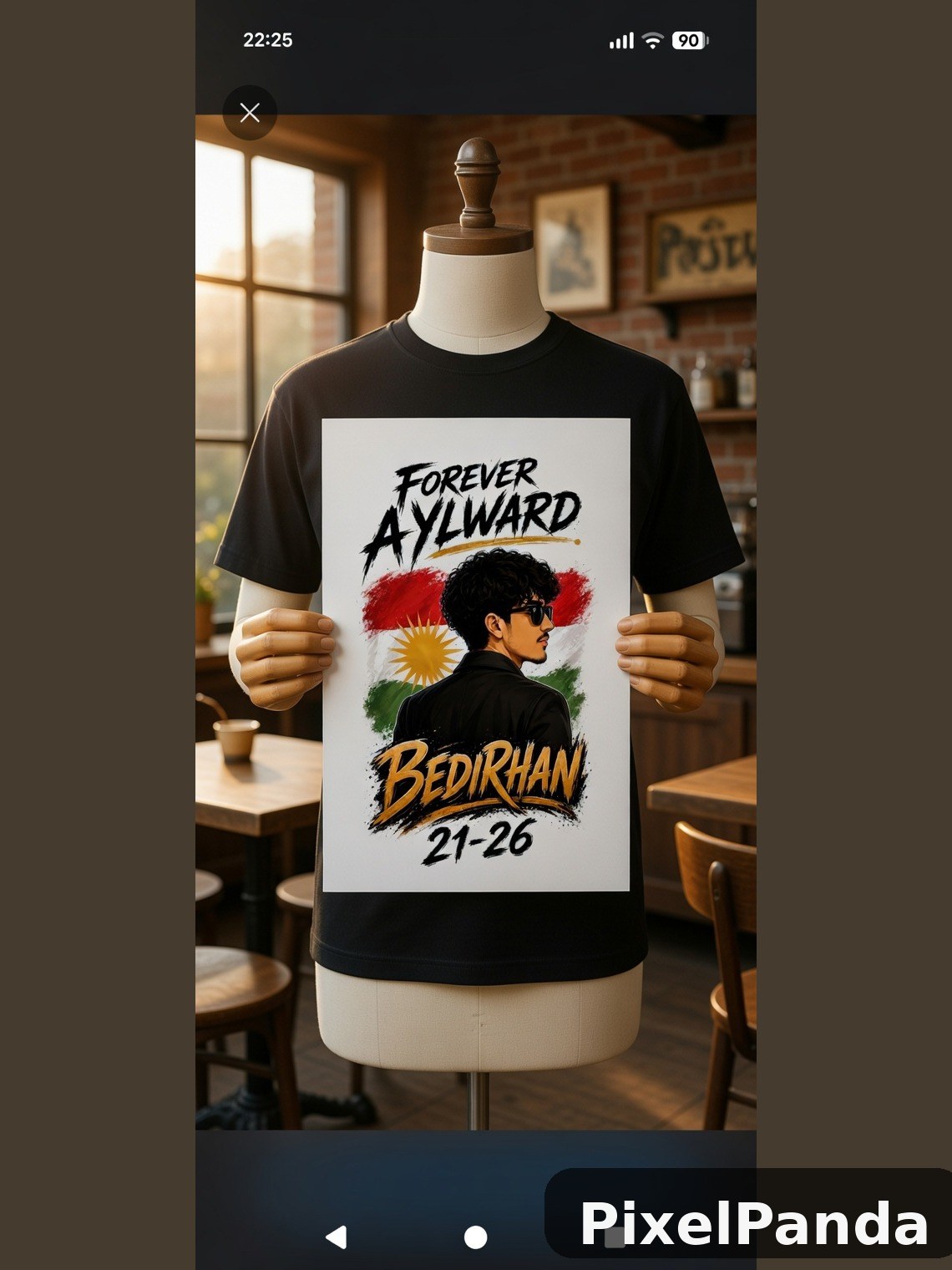 Black t-shirt with graphic print on dress form indoors