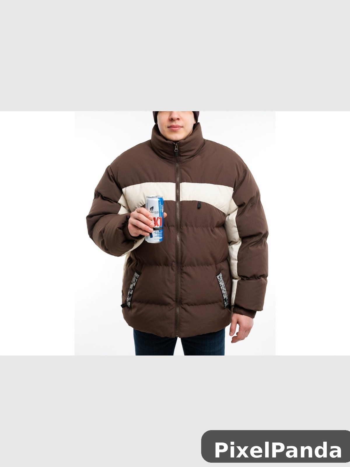 Person in brown and cream puffer jacket holding beverage can