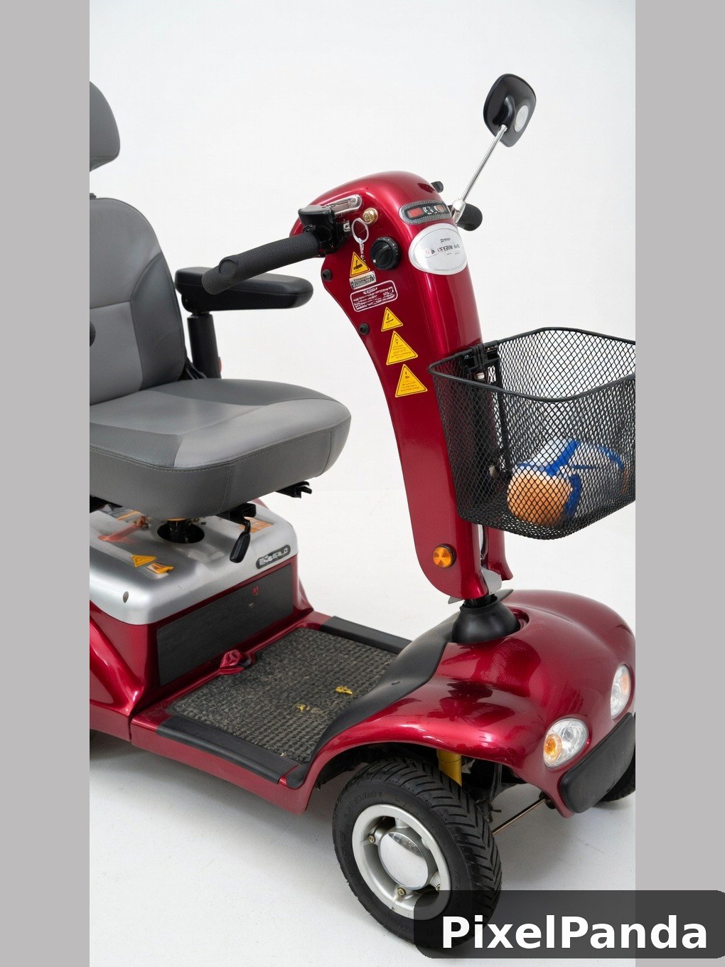 Red four-wheel mobility scooter with gray padded seat and front basket
