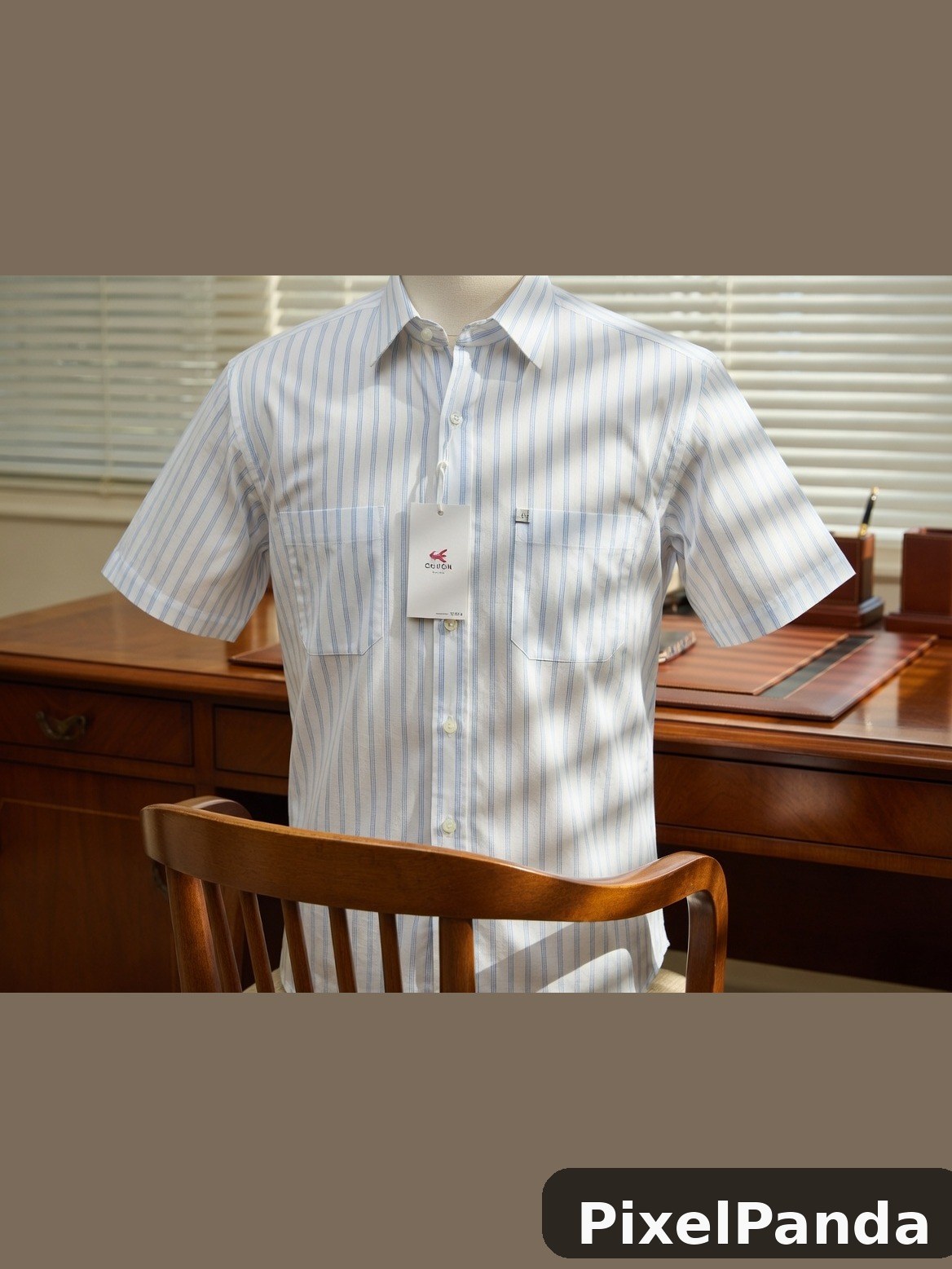 Light blue striped short-sleeve button-up shirt on wooden chair