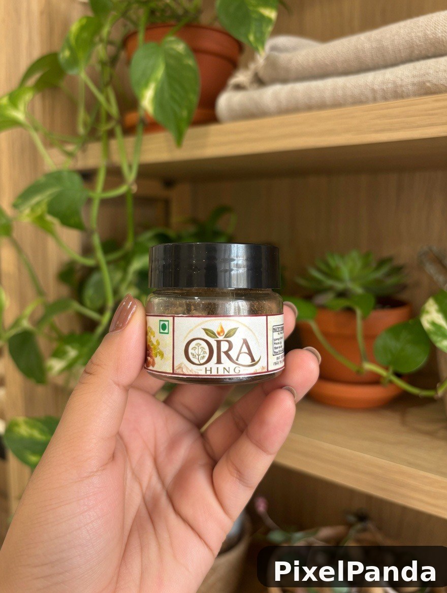 Hand holding small jar of spice blend with wooden shelf and potted plants
