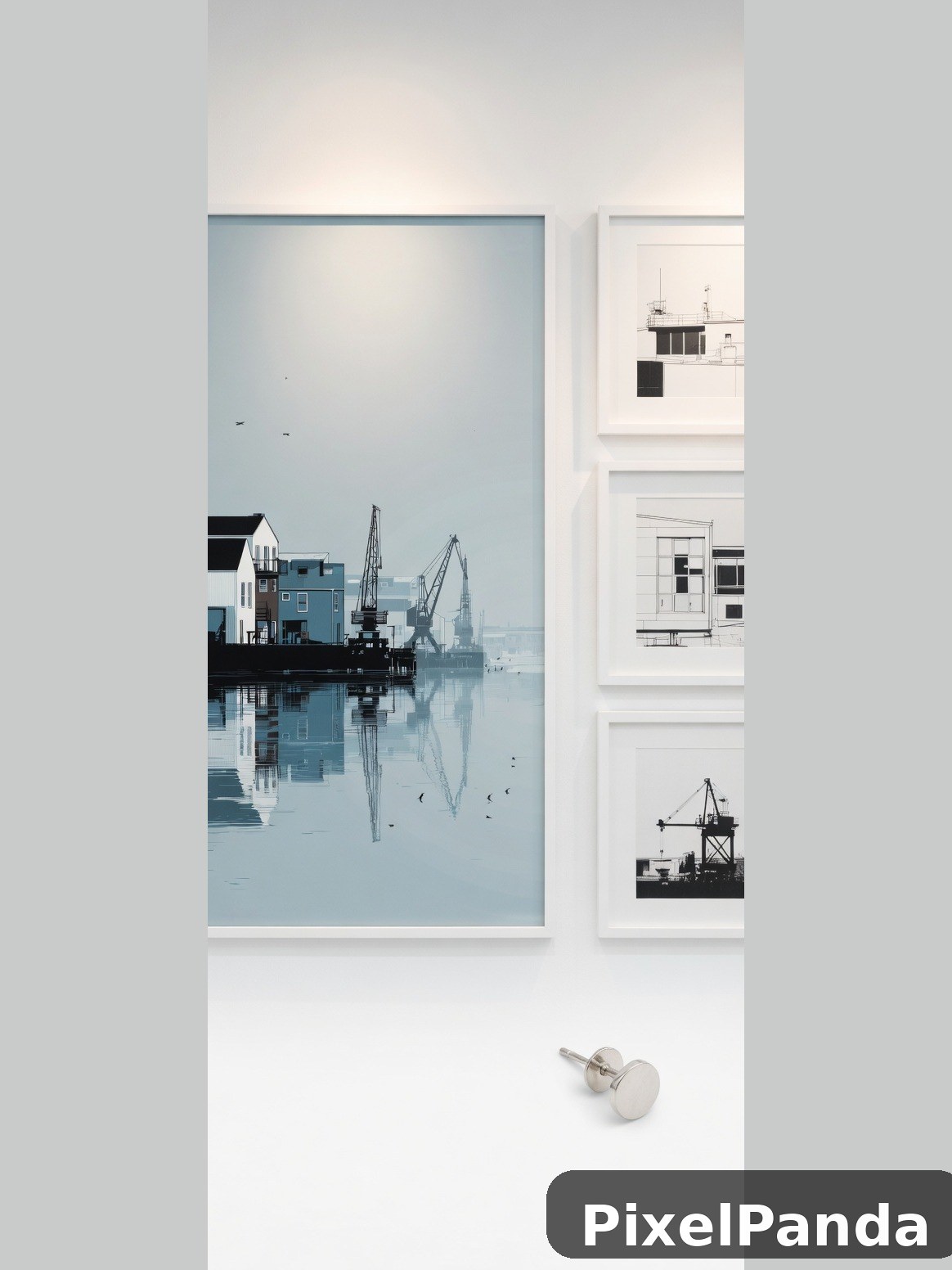 Industrial waterfront paintings and architectural drawings on white wall