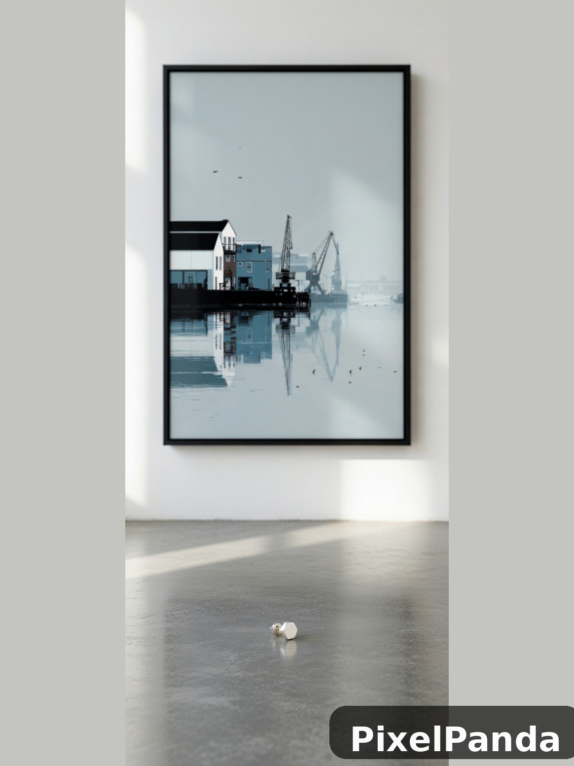 Framed industrial harbor scene with cranes and reflection