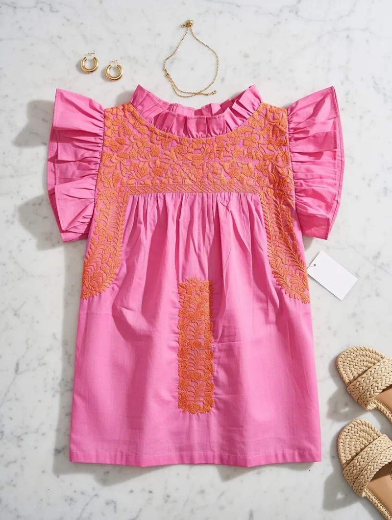 Flat lay of Embroidered Ruffle Top