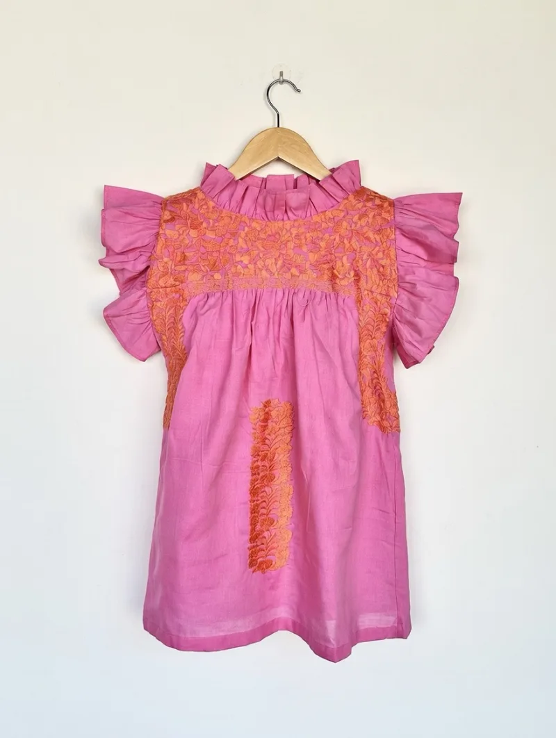 Hanger shot of Embroidered Ruffle Top